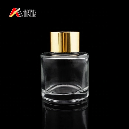 50ml clear glass aroma diffuser bottle with gold aluminum covered screw cap and plastic plug