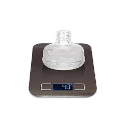 Luxury round clear 20ml cosmetic glass dropper lotion bottle with gold aluminum covered dropper cap
