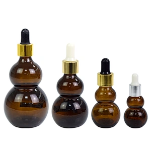 wholesale 10ml 20ml 50ml 100ml amber glass bottle personal care packaging custom dropper essential oil bottle