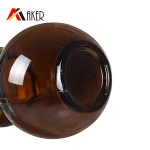 Wholesale cucurbit special 100ml amber cosmetic essential oil glass bottle with gold aluminum cap