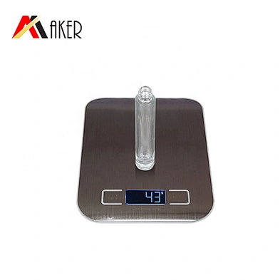 New arrival round shape empty clear 8ml glass roll on perfume bottle with gold cap and stainless steel roller