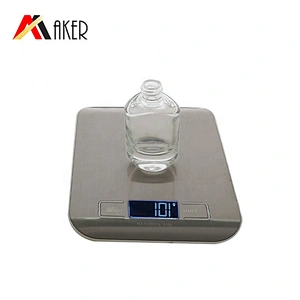 Luxury 30ml clear round cosmetic lotion glass cream bottle with electroplated silver dropper