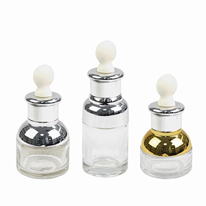 designer glass cosmetic drop bottle essential oil packaging personal care clear child proof dropper bottle