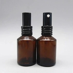 Slant shoulder round empty 60ml 100ml glass mist sprayer serum bottle with all metal pump