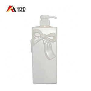 Special design white 900ml HDPE plastic shampoo lotion bottle with bow knot and lotion pump