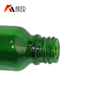 Factory wholesale Low MOQ 30ml empty round green cosmetic essential oil glass dropper bottle