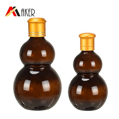 Wholesale cucurbit special 100ml amber cosmetic essential oil glass bottle with gold aluminum cap