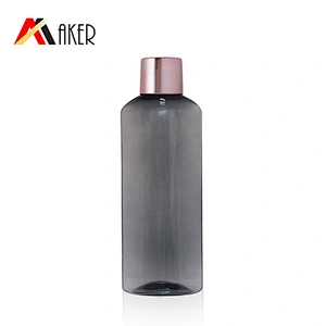 New arrival 100ml semi-transparent black plastic PET bottle for cosmetic packaging with rose gold luxury screw cap