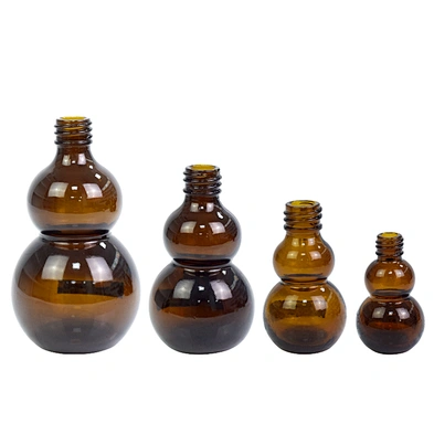 wholesale 10ml 20ml 50ml 100ml amber glass bottle personal care packaging custom dropper essential oil bottle