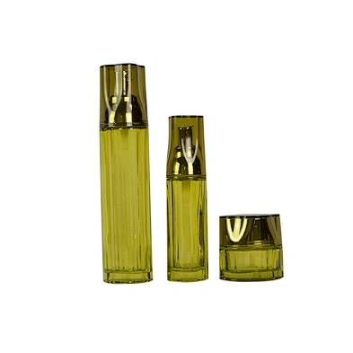 High Quality Transparent Green Cosmetic Skin Care Glass Bottle And Jars Sets Elegant Shape
