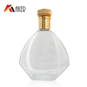 Special design empty clear 700ml XO brandy wine glass bottle with gold aluminum covered cork