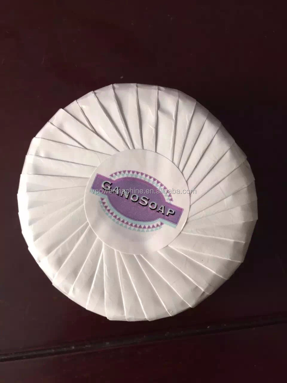 Full Automatic Hotel Soap Roll Paper Pleat Wrapping Machine Round Shaped Soap Wrapper Equipment With Labeling Function