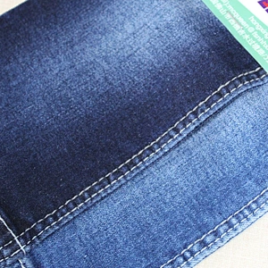 Stocklot stretch cotton recycled twill vietnam selvedge denim jeans fabric prices