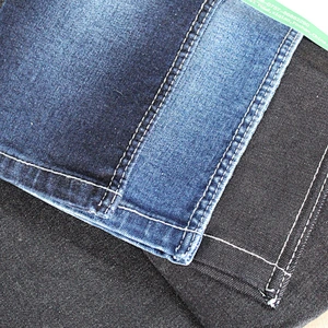 Stocklot stretch cotton recycled twill vietnam selvedge denim jeans fabric prices