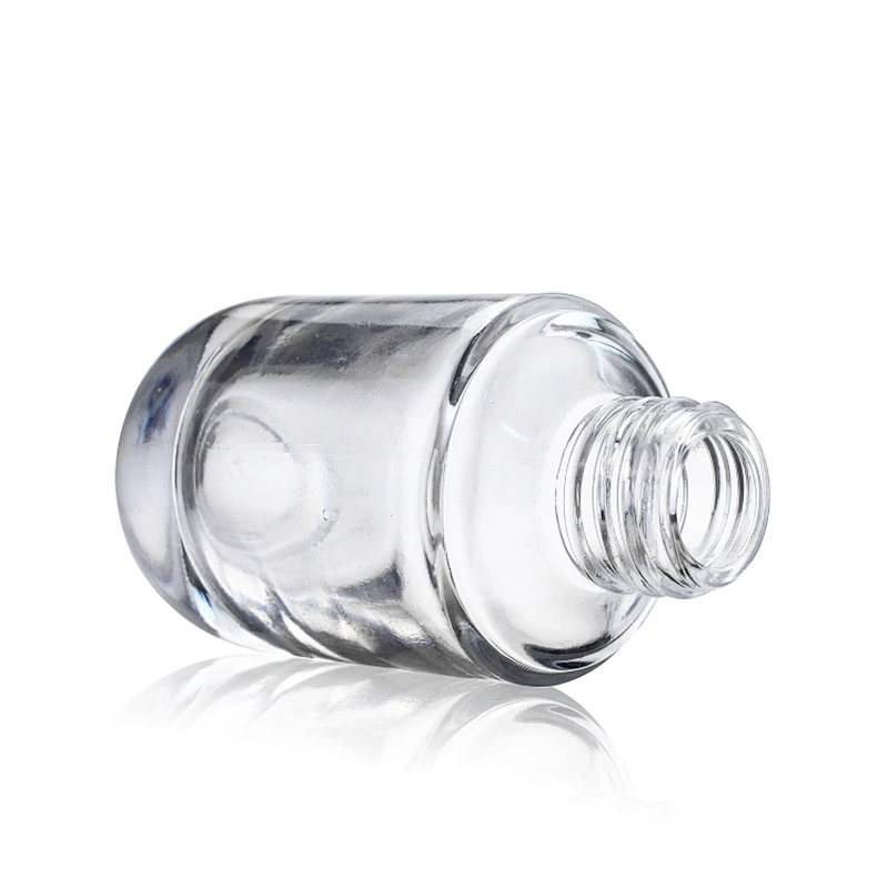 30ml empty glass bottles foundation bottle pump with plastic clear cap for cosmetic packaging