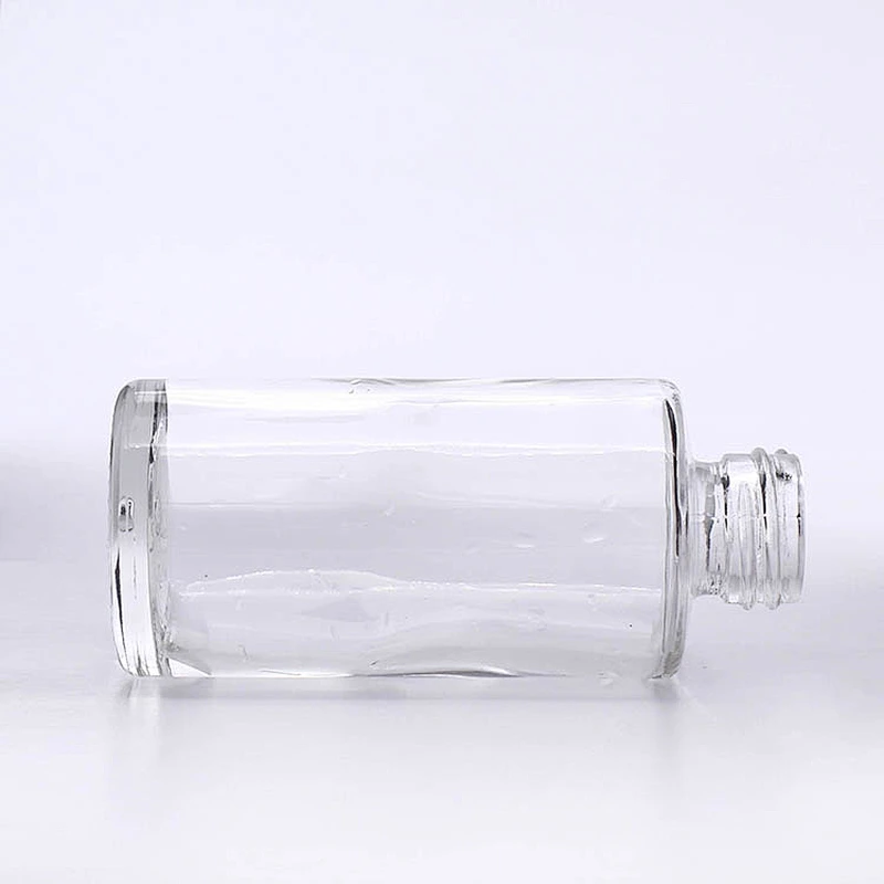 luxury Popular 40ml  clear round shape foundation glass cosmetic bottles plastic acrylic cap