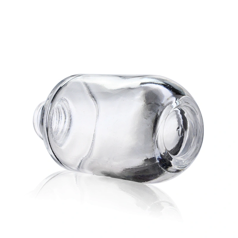 30ml empty glass bottles foundation bottle pump with plastic clear cap for cosmetic packaging
