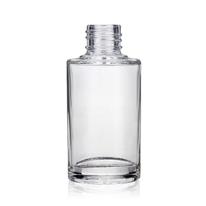 Hot sale empty  glass cosmetic 40ml transparent foundation black pump clear glass bottle with gold cap