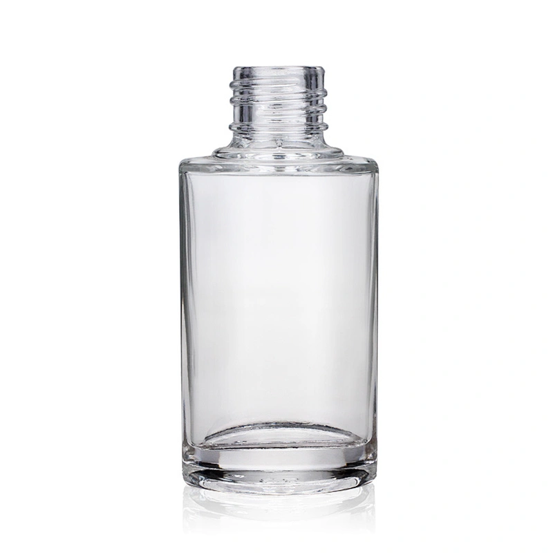 Hot sale empty  glass cosmetic 40ml transparent foundation black pump clear glass bottle with gold cap