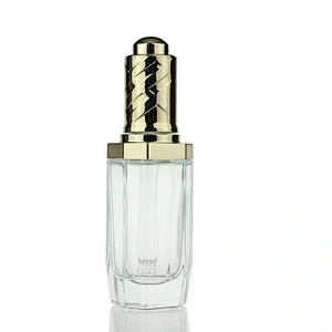 New Design  Glass Bottles Massage Oil Glass Dropper Bottle 35ml Clear Custom Serum Face Oil Bottles Container Manufacturers