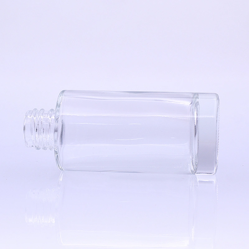 new design cosmetic packaging 30ml 1oz clear glass spray bottle lotion bottle foundation packaging gold pump