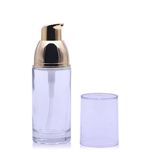 new design cosmetic packaging 30ml 1oz clear glass spray bottle lotion bottle foundation packaging gold pump