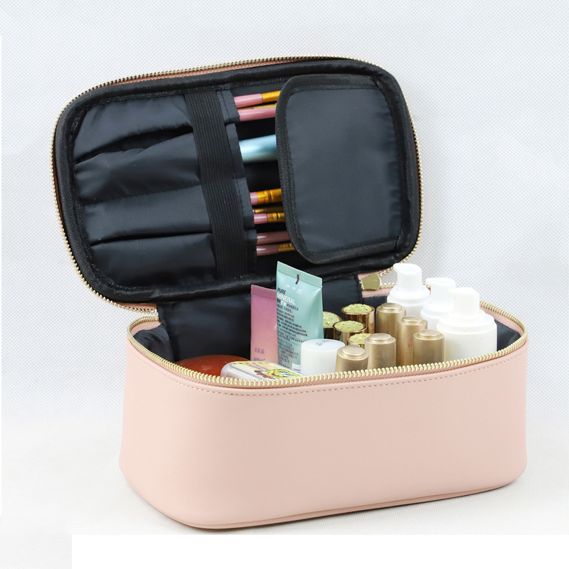 makeup train case with makeup brush slots