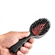 black paddle hair brush