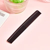 Carbon fiber comb