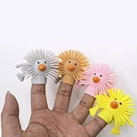 How do the children play with finger puppet toys?