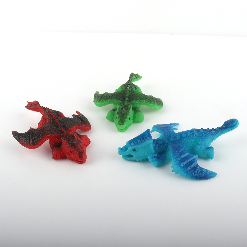 Dinosaur slingshot toy