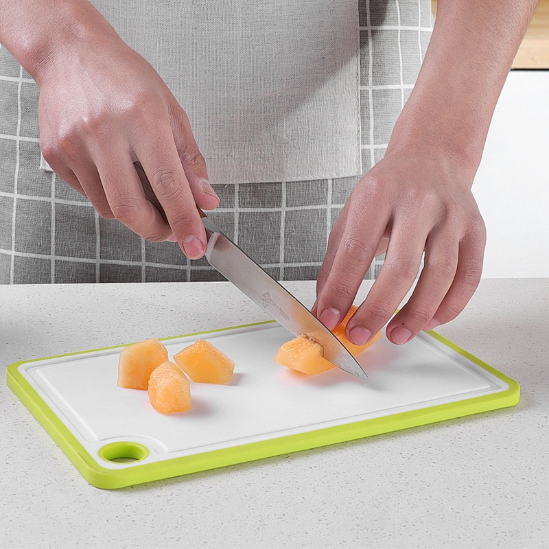 Anti spill no slip plastic kitchen cutting board