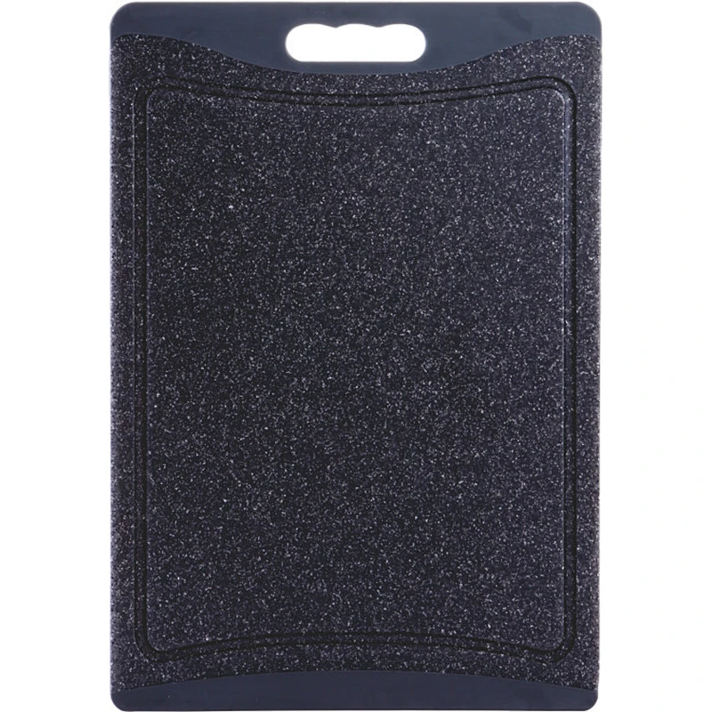 Non-slip plastic cutting board with easy grip handle