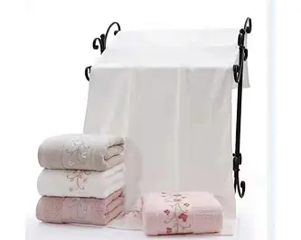 dobby bath towel with embroidered butterfly and flower