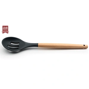 hot sale ultra heat resistant food grade silicone kitchen silicone slotted spoon with beech handle