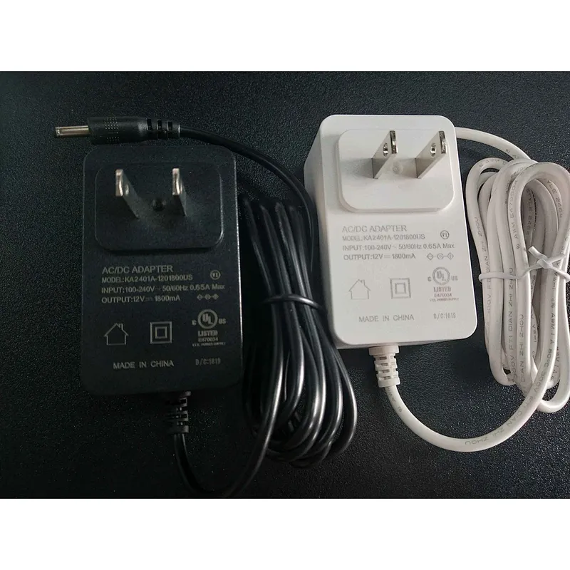 El adaptador de corriente al por mayor 12v1a se aplica a la fuente de alimentación de la pared del enrutador de la cámara CCTV con luz LED con buena calidad