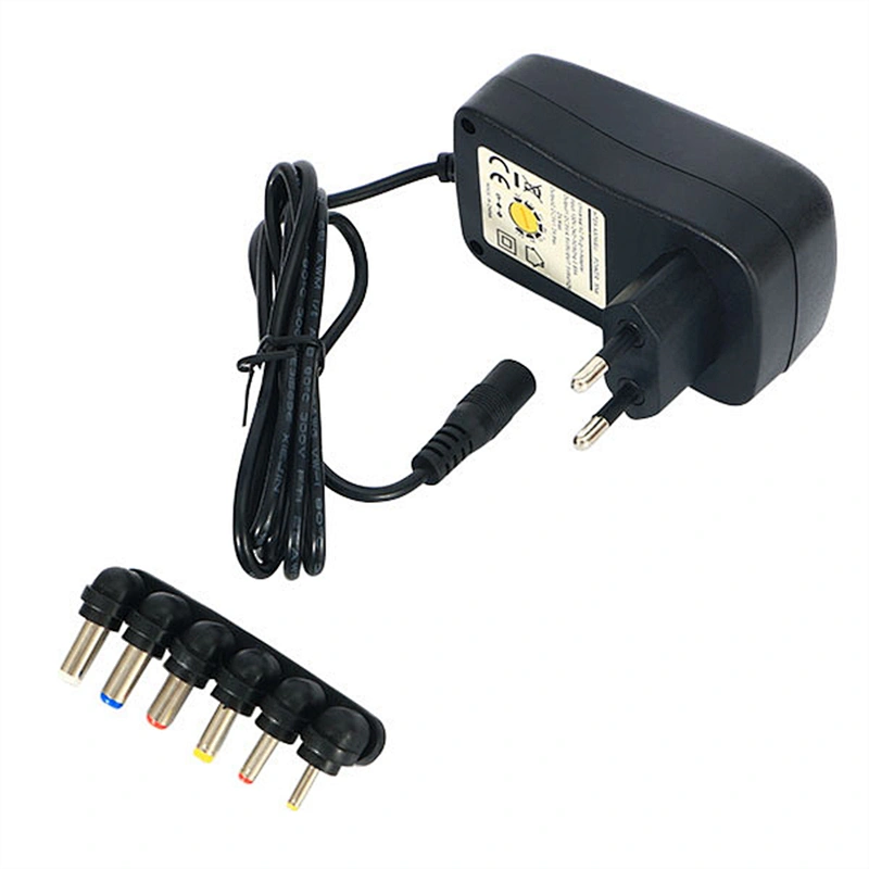 Adaptador de conmutación de fuente de alimentación regulada universal de CA CC de 24 W de 3 V ~ 12 V de voltaje múltiple con 6 puntas seleccionables