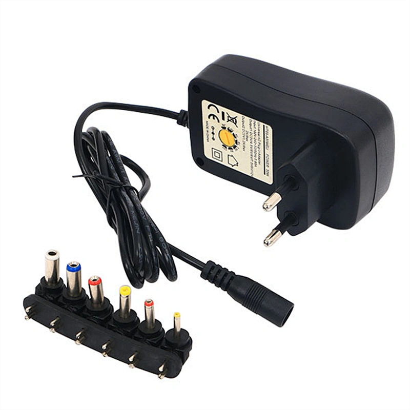 Adaptador de conmutación de fuente de alimentación regulada universal de CA CC de 24 W de 3 V ~ 12 V de voltaje múltiple con 6 puntas seleccionables