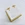 suministros aretes