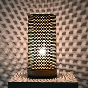Simple antique brass hollow out metal cylinder travertine stone base table lamp for living room