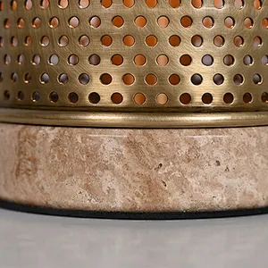 Simple antique brass hollow out metal cylinder travertine stone base table lamp for living room