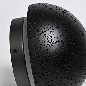 Solar eclipse natural black travertine stone wall light