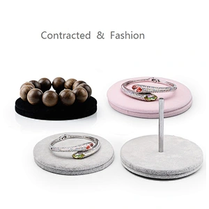 Three round ice flowered velvet jewelry display rack