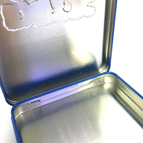 Embossed gift tin with hinge