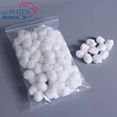 Absorbent cotton wool ball