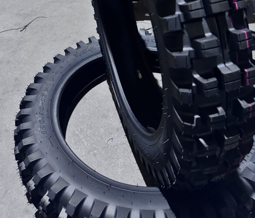 Motorcycle tire sidewall showing size and product markings