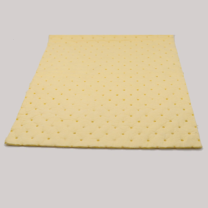 Chemical absorbent pads