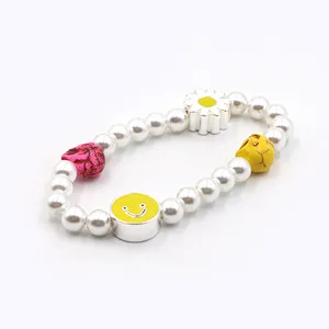 Fashion pearl enamel smile face flower skull cute charm bracelet for girl