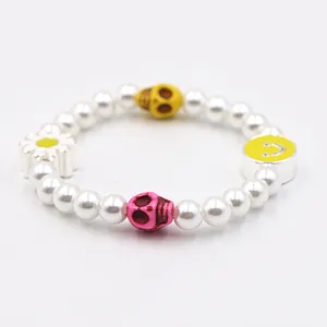 Fashion pearl enamel smile face flower skull cute charm bracelet for girl