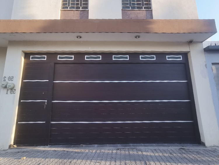 manual garage door problems
